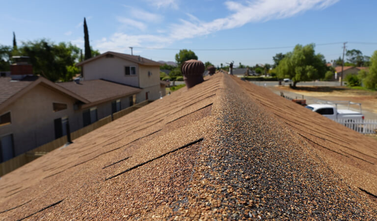 A roof that has been covered with gravel.