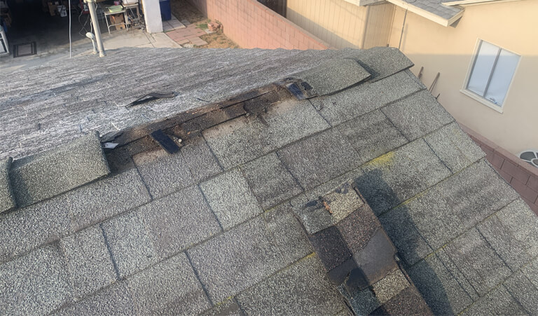 A roof that has been damaged by the rain.