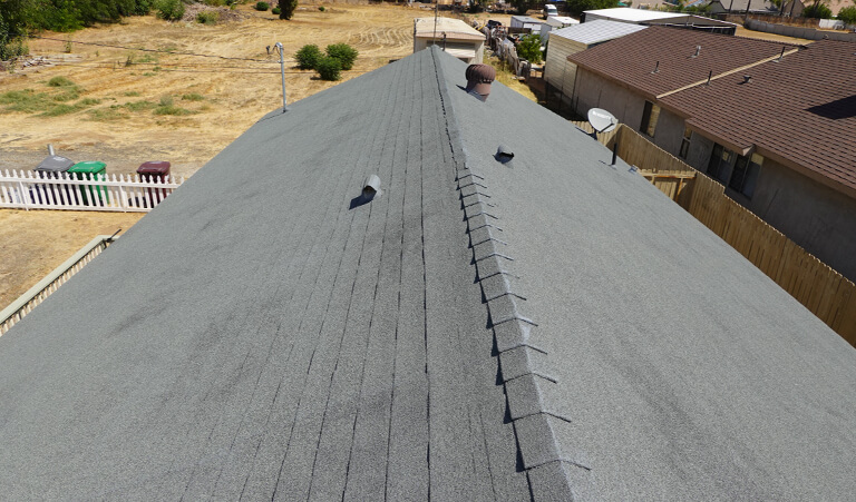 A roof that has been covered with asphalt.