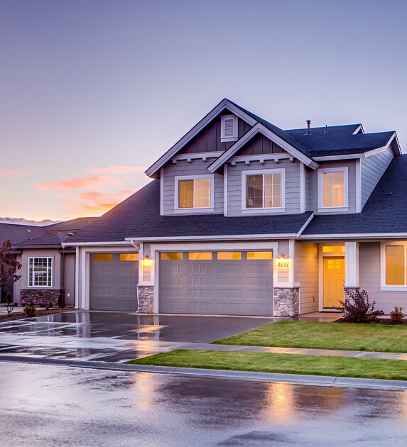 A house with a lot of grass in front of it